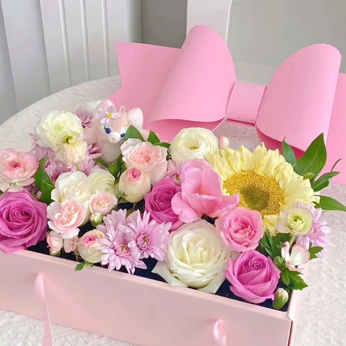 Caja para flores moño rosa