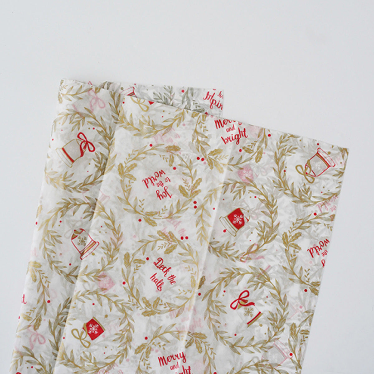 Papel tipo seda navideño paquete de 10 pliegos con diseños variados para arreglos florales, ramos y flores.