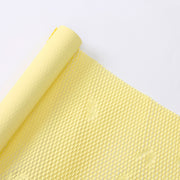 Rollo de papel perforado para ramos color amarillo 50 cm x 7 m