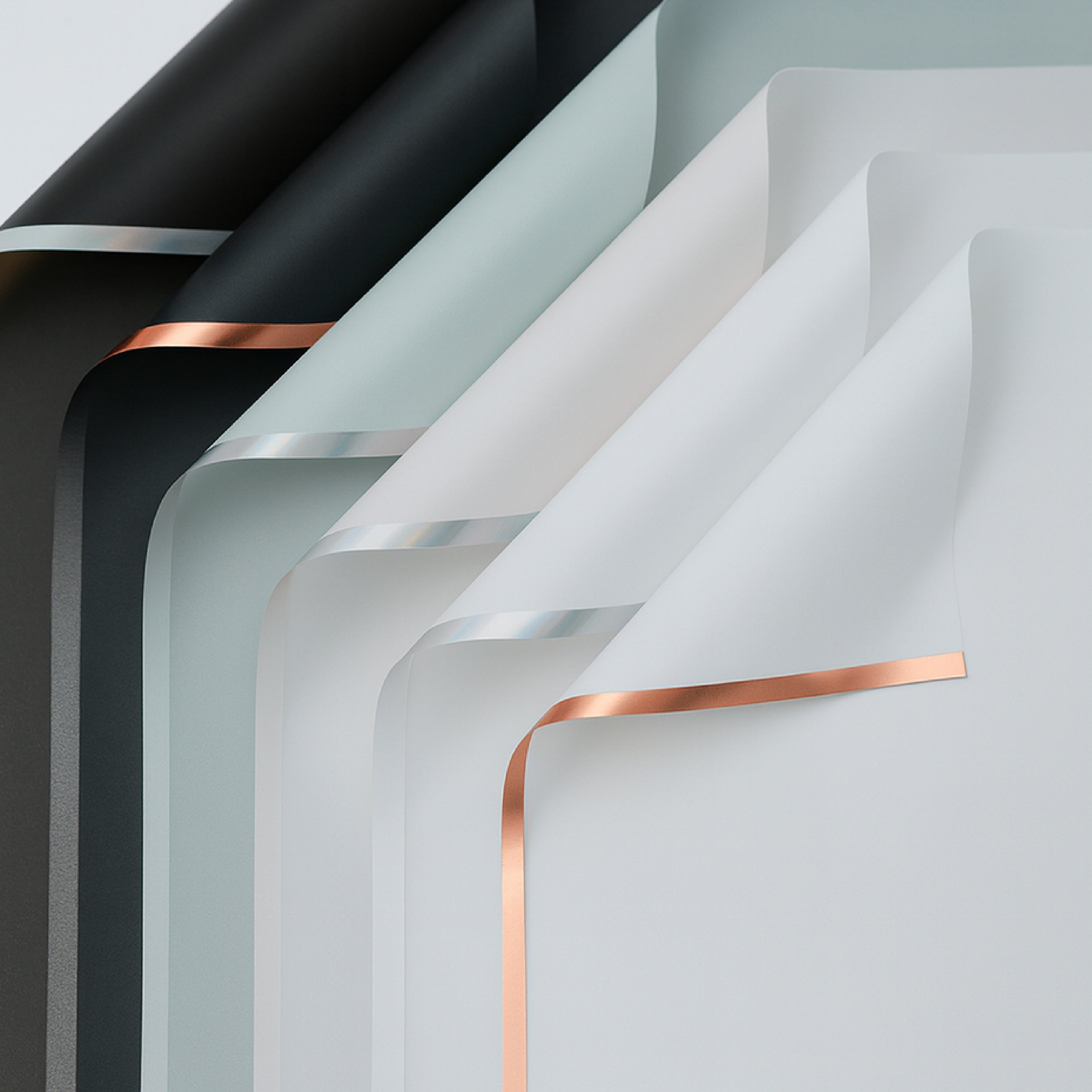 Paquete de 20 pliegos de papel coreano con franjas holográficas. Colores blanco y negro con bordes plateados o dorados. Ideal para envolver flores.