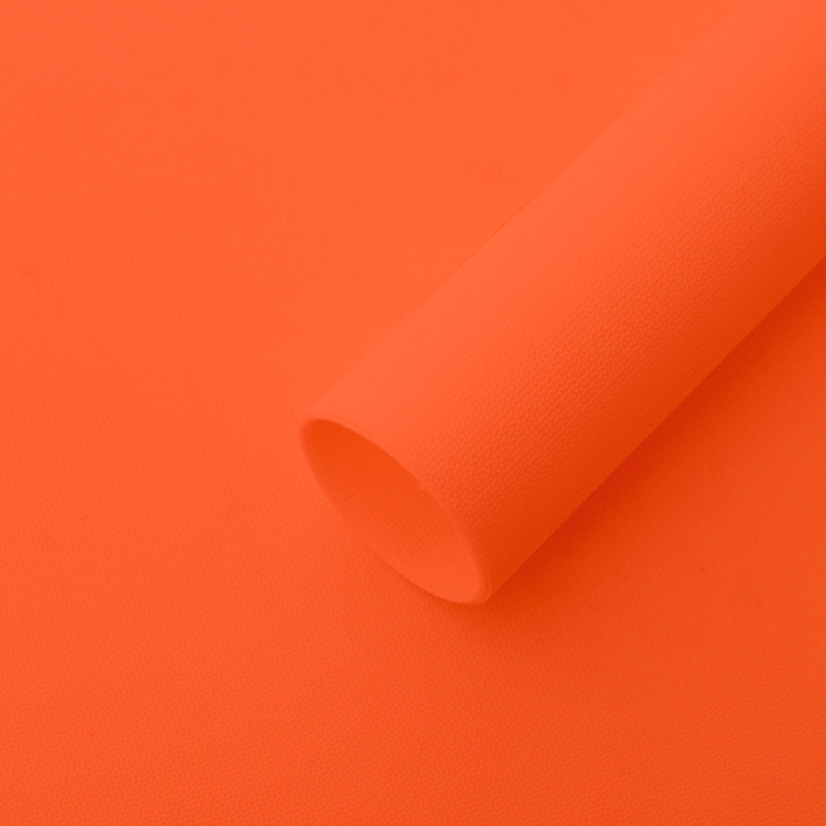 Papel coreano tipo pellón en colores  naranja. Insumo para floreria, ramos y envolver flores, de alta calidad.