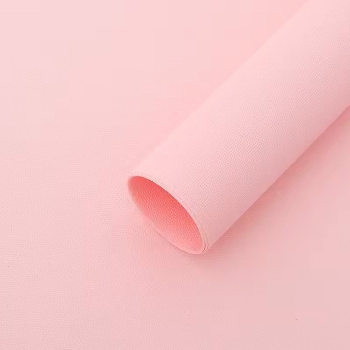 Papel coreano tipo pellón en colores  rosa. Insumo para floreria, ramos y envolver flores, de alta calidad.
