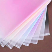 Paquete de 20 pliegos de papel coreano degradado con marco blanco en colores fucsia, lavanda, durazno, rosa y negro. Ideal para envolver ramos y flores. Insumos para florerías.